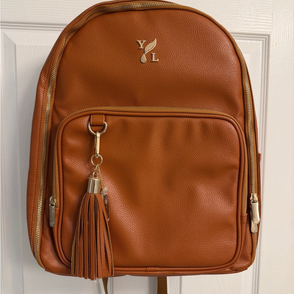 Young Living Leather Backpack with 140 Essential Oil Holders - NEW NEVER USED.
